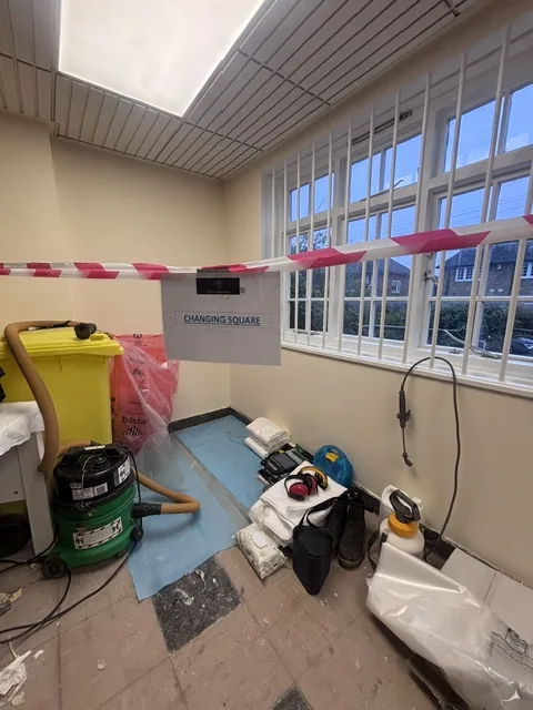 Asbestos floor tile and bitumen removal in East Sheen